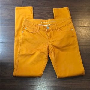 Burnt orange skinny jeans